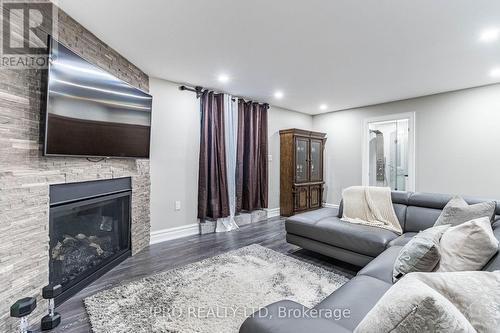 23 Glenbrook Boulevard, Brampton, ON - Indoor Photo Showing Living Room With Fireplace