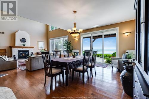 1 Mettawas Lane, Kingsville, ON - Indoor Photo Showing Dining Room With Fireplace