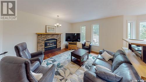 2911 E Neff Road, Regina, SK - Indoor Photo Showing Living Room With Fireplace