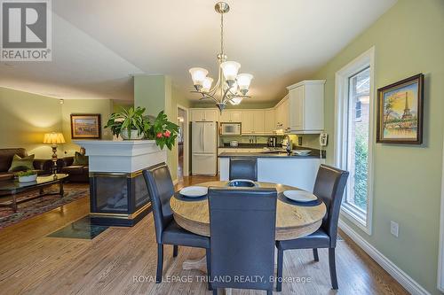 3 - 448 Commissioners Road E, London, ON - Indoor Photo Showing Dining Room With Fireplace