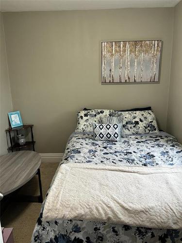 715 7Th Street, Brandon, MB - Indoor Photo Showing Bedroom