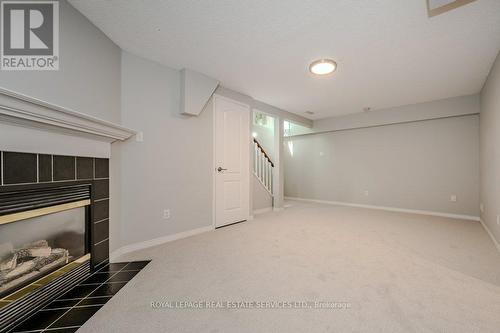 48B - 1084 Queen Street W, Mississauga (Lorne Park), ON - Indoor Photo Showing Other Room With Fireplace