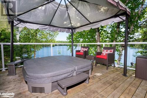 Hot Tub - 45 Woods Lane, Port Severn, ON - Outdoor With Body Of Water With Deck Patio Veranda With Exterior