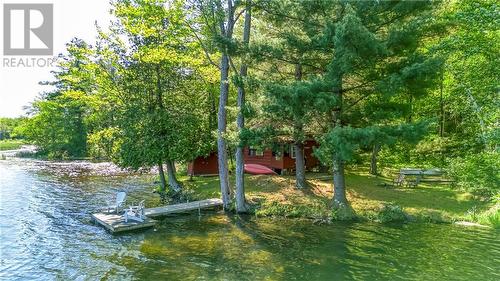 Just imagine relaxing here this summer! ... - 2105 Pike Lake Rte 16A Route, Perth, ON - Outdoor With Body Of Water