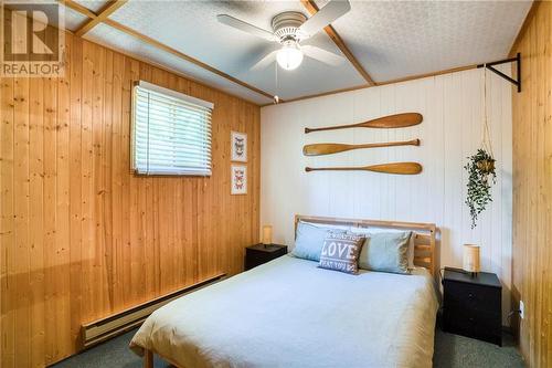 Private, spacious primary bedroom ... - 2105 Pike Lake Rte 16A Route, Perth, ON - Indoor Photo Showing Bedroom