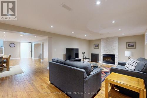 17 College Street, Toronto, ON - Indoor Photo Showing Living Room With Fireplace