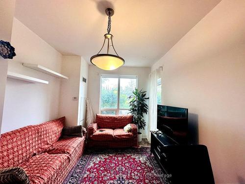 110-7165 Yonge St, Markham, ON - Indoor Photo Showing Living Room