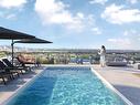 Piscine - 409W-8510 Rue Jean-Nicolet, Montréal (Saint-Léonard), QC  - Outdoor With In Ground Pool With View 