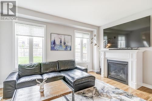 2056 Allison Street, Innisfil, ON - Indoor Photo Showing Living Room With Fireplace