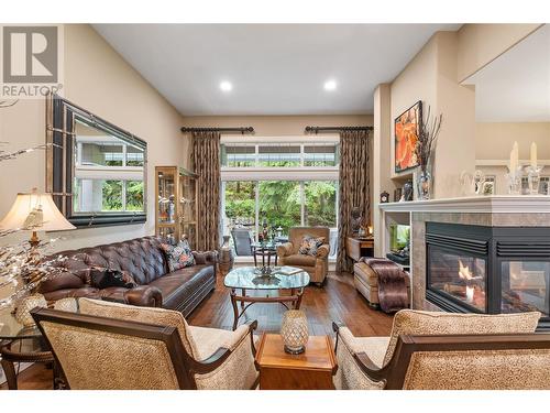 4520 Gallaghers Lookout Unit# 28, Kelowna, BC - Indoor Photo Showing Living Room With Fireplace