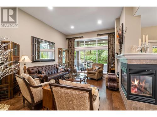 4520 Gallaghers Lookout Unit# 28, Kelowna, BC - Indoor Photo Showing Living Room With Fireplace