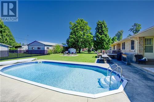 255 Finkle Street, Woodstock, ON - Outdoor With In Ground Pool With Backyard