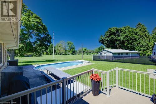 255 Finkle Street, Woodstock, ON - Outdoor With In Ground Pool With Deck Patio Veranda With Backyard