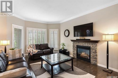 118 Beechdale Crescent, Saskatoon, SK - Indoor Photo Showing Living Room With Fireplace