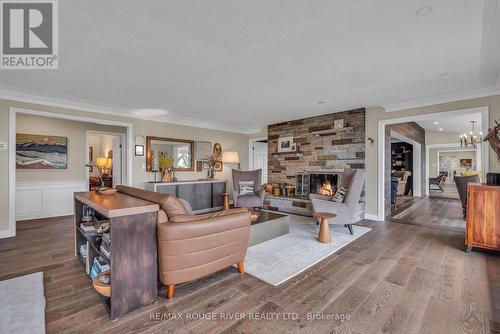 7 Sunrise Court, Cobourg, ON - Indoor Photo Showing Living Room With Fireplace