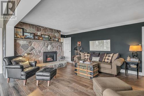 7 Sunrise Court, Cobourg, ON - Indoor Photo Showing Living Room With Fireplace