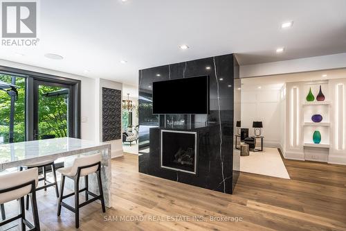 1242 Ravine Drive, Mississauga, ON - Indoor Photo Showing Dining Room With Fireplace