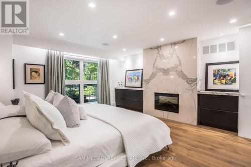 1242 Ravine Drive, Mississauga, ON - Indoor Photo Showing Bedroom With Fireplace