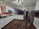 235 3Rd Avenue Ne, Swift Current, SK  - Indoor Photo Showing Kitchen With Double Sink 