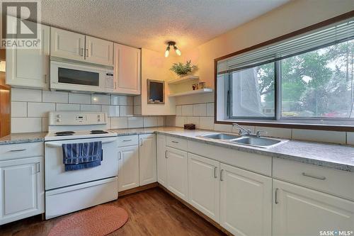 5818 Sherwood Drive, Regina, SK - Indoor Photo Showing Kitchen With Double Sink
