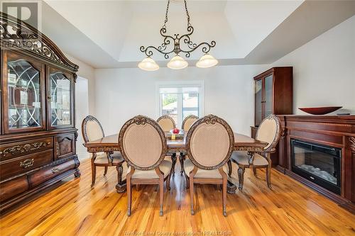 12303 Vickery Lane, Tecumseh, ON - Indoor Photo Showing Dining Room With Fireplace