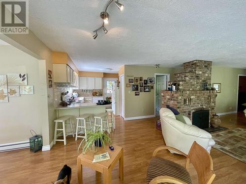 6472 Ewen Road, 100 Mile House, BC - Indoor Photo Showing Living Room With Fireplace