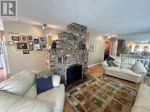 6472 Ewen Road, 100 Mile House, BC - Indoor Photo Showing Living Room With Fireplace