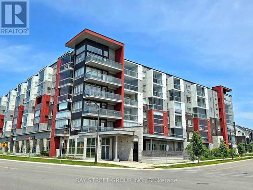512 - 2 Adam Sellers Street, Markham, ON - Outdoor With Balcony With Facade