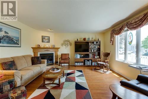 5700 Blackwell Sideroad Unit# 215, Sarnia, ON - Indoor Photo Showing Living Room With Fireplace