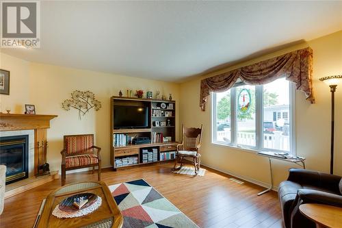 5700 Blackwell Sideroad Unit# 215, Sarnia, ON - Indoor Photo Showing Living Room With Fireplace