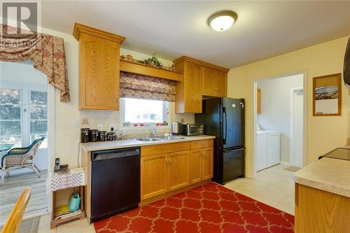 5700 Blackwell Sideroad Unit# 215, Sarnia, ON - Indoor Photo Showing Kitchen With Double Sink