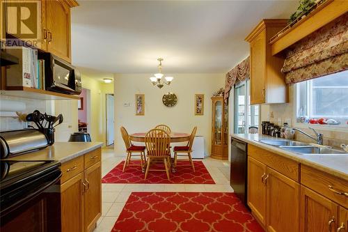 5700 Blackwell Sideroad Unit# 215, Sarnia, ON - Indoor Photo Showing Kitchen With Double Sink