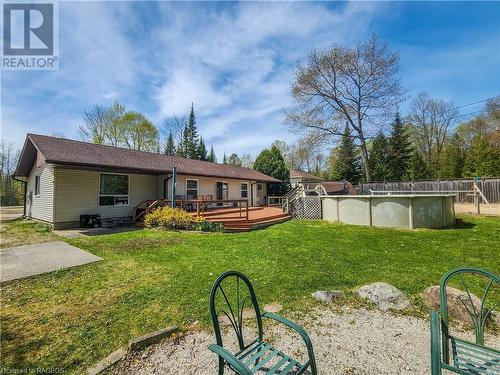 27 Hemlock Road, Oliphant, ON - Outdoor With Above Ground Pool With Deck Patio Veranda