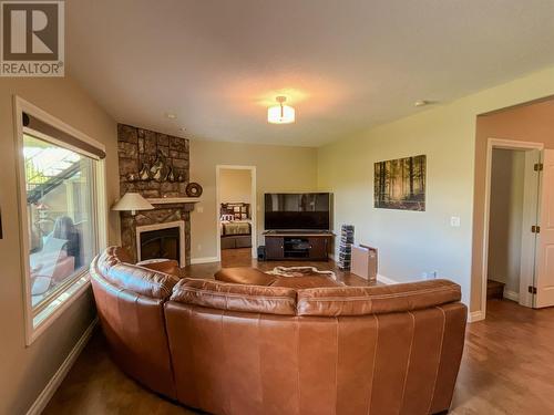 11911 Olympic View Drive, Osoyoos, BC - Indoor Photo Showing Living Room With Fireplace