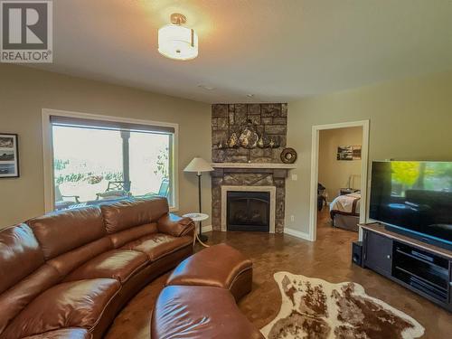 11911 Olympic View Drive, Osoyoos, BC - Indoor Photo Showing Living Room With Fireplace