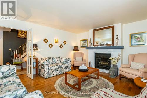 129 Main Street, Southwest Middlesex, ON - Indoor Photo Showing Living Room With Fireplace
