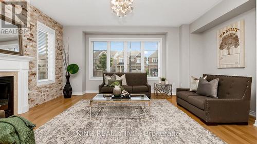 77 Antibes Drive, Brampton, ON - Indoor Photo Showing Living Room With Fireplace