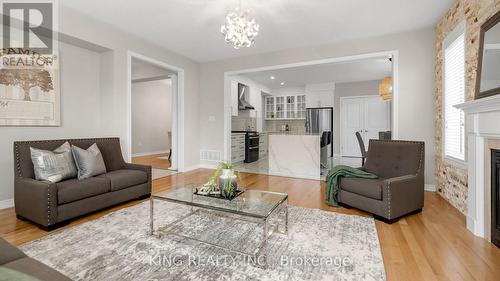 77 Antibes Drive, Brampton, ON - Indoor Photo Showing Living Room With Fireplace