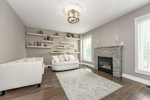 12 Hayloft Crt, Brampton, ON - Indoor Photo Showing Living Room With Fireplace