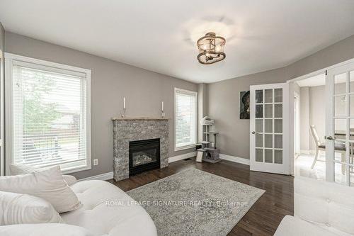 12 Hayloft Crt, Brampton, ON - Indoor Photo Showing Living Room With Fireplace