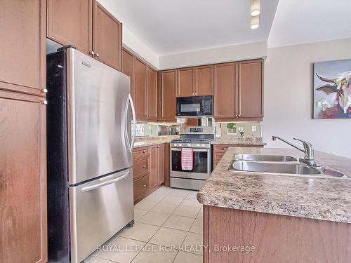 124 Downy Emerald Dr, Bradford West Gwillimbury, ON - Indoor Photo Showing Kitchen With Double Sink