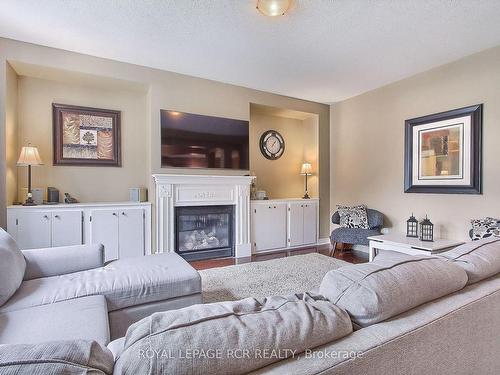 124 Downy Emerald Dr, Bradford West Gwillimbury, ON - Indoor Photo Showing Living Room With Fireplace