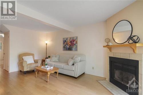 5 Saxton Private, Ottawa, ON - Indoor Photo Showing Living Room With Fireplace