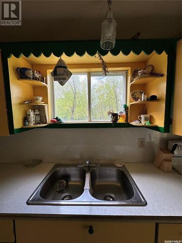 28 Oak Bay, Round Lake, SK - Indoor Photo Showing Kitchen With Double Sink