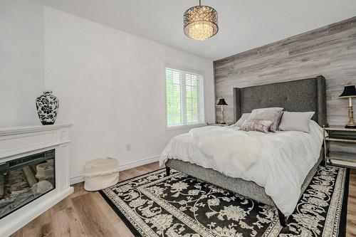 446 Beach Boulevard, Hamilton, ON - Indoor Photo Showing Bedroom With Fireplace