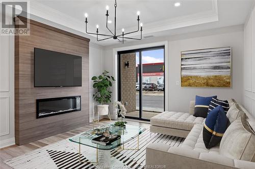 1855 Wyoming Unit# 302, Lasalle, ON - Indoor Photo Showing Living Room With Fireplace