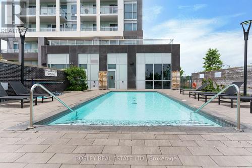 908 - 1050 Main Street E, Milton, ON - Outdoor With In Ground Pool