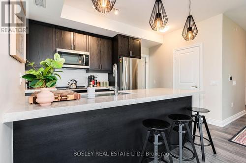 908 - 1050 Main Street E, Milton, ON - Indoor Photo Showing Kitchen With Stainless Steel Kitchen