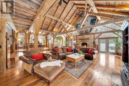 3135 Theatre Road N, Hamilton Township, ON - Indoor Photo Showing Living Room With Fireplace