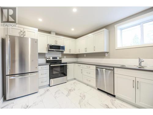 5205 Oleander Drive, Osoyoos, BC - Indoor Photo Showing Kitchen With Double Sink